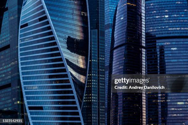 moscow skyscrapers at night. closeup image. - russia architecture stock pictures, royalty-free photos & images
