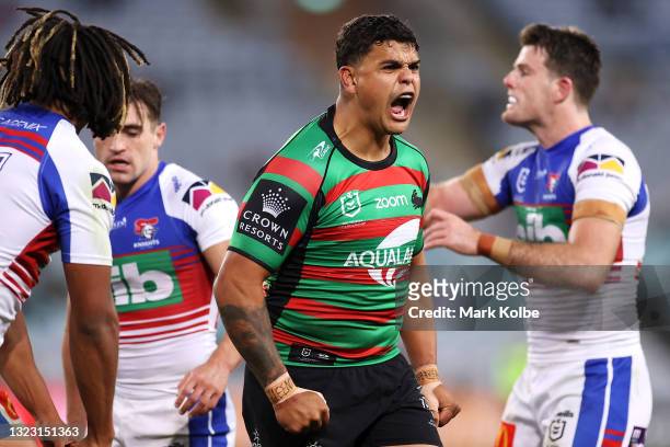 Latrell Mitchell of the Rabbitohs celebrates forcing an error during the round 14 NRL match between the South Sydney Rabbitohs and the Newcastle...