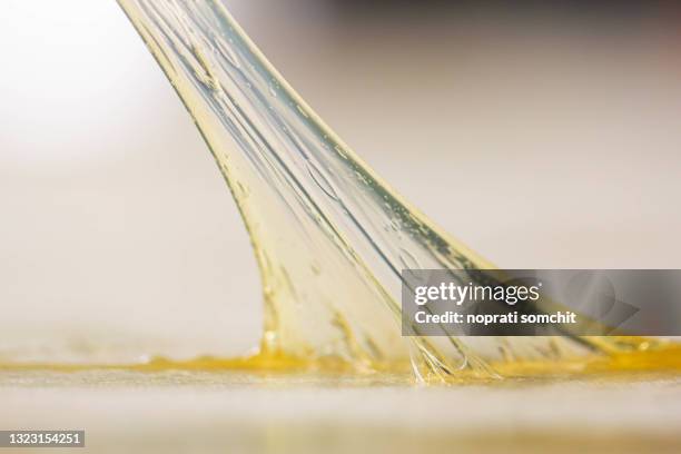 closeup rubber adhesive that is used in general and in factories - glue stock pictures, royalty-free photos & images