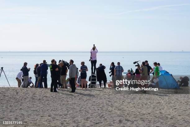 Cameramen at work as Oxfam campaigners pose as G7 leaders as the charity calls on the G7 to commit to cutting emissions further and faster on June...