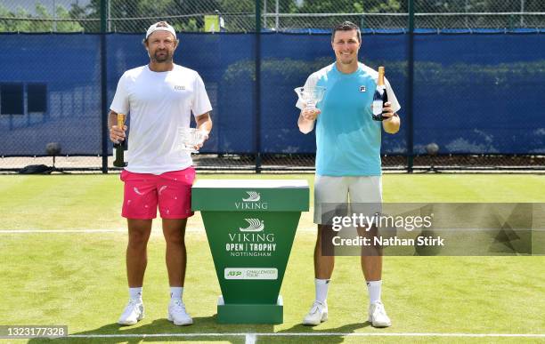 Matt Reid of Australia and Ken Skupski of Great Britain pose with the Viking Nottingham Mens Doubles Trophy on day eight after at Nottingham Tennis...