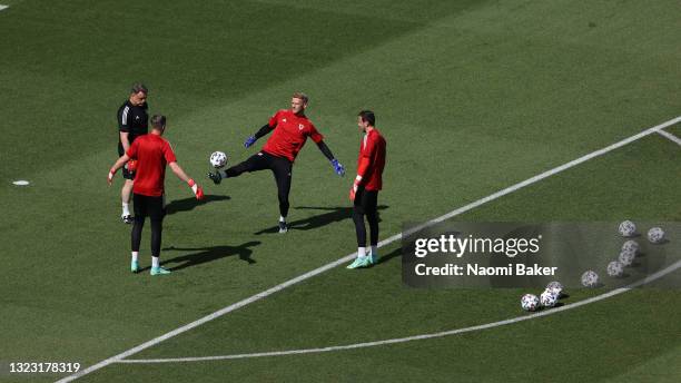 Adam Davies of Wales warms up with team mates Wayne Hennessey and Danny Ward prior to the UEFA Euro 2020 Championship Group A match between Wales and...