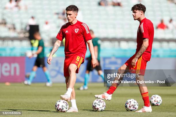 Harry Wilson and Neco Williams of Wales look on as they warm up prior to the UEFA Euro 2020 Championship Group A match between Wales and Switzerland...