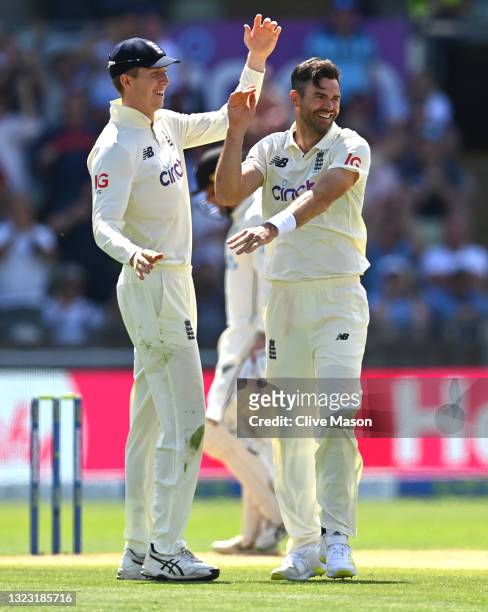 England bowler James Anderson celebrates with Zak Crawley after taking the wicket of Neil Wagner during day three of the second LV= Insurance Test...