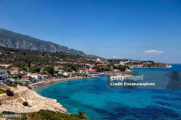 high angle view of kaynarpinar village at seaside in aegean turkey. - izmir stock pictures, royalty-free photos & images