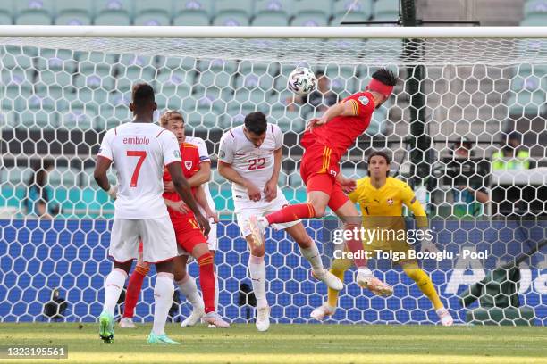 Kieffer Moore of Wales scores their side's first goal past Yann Sommer of Switzerland during the UEFA Euro 2020 Championship Group A match between...