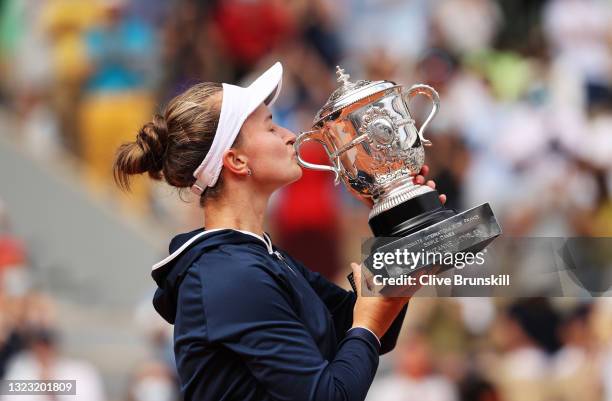 Match Winner Barbora Krejcikova of Czech Republic kisses the winners trophy after the Women’s final on day fourteen of the 2021 French Open at Roland...