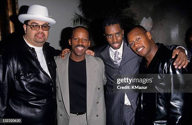 Heavy D, Sean "Puffy" Combs and Andre Harrell attend Justin's Opening on September 30, 1997 in New York City.