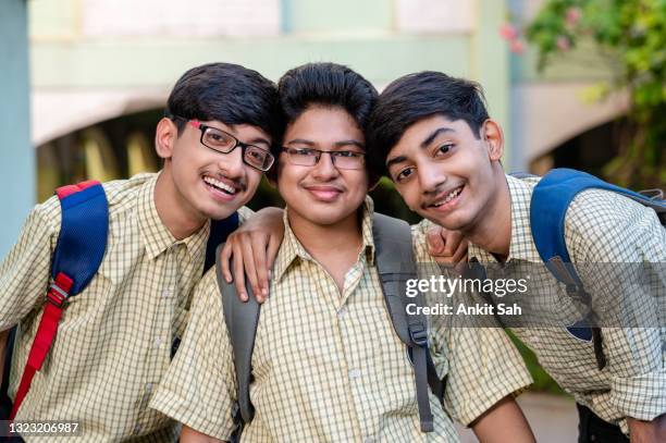 portrait of young three indian student - uniform stock pictures, royalty-free photos & images