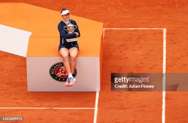 Match Winner Barbora Krejcikova of Czech Republic holds the Winners Trophy after the Women’s final on day fourteen of the 2021 French Open at Roland...