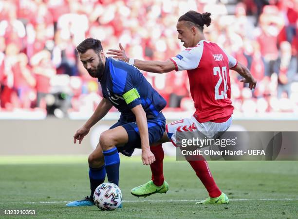 Tim Sparv of Finland is closed down by Yussuf Poulsen of Denmark during the UEFA Euro 2020 Championship Group B match between Denmark and Finland on...