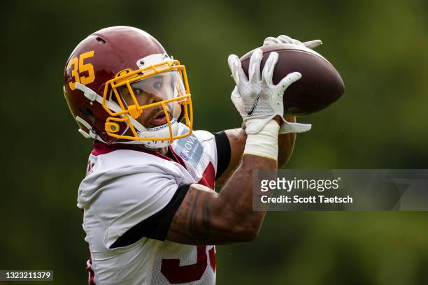 Jaret Patterson of the Washington Football Team catches a pass during mandatory minicamp at Inova Sports Performance Center on June 9, 2021 in...