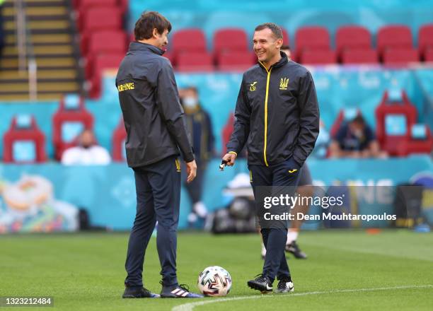 Andriy Shevchenko , Head Coach of Ukraine speaks with Oleksandr Shovkovskiy, Technical Coach of Ukraine during the Ukraine Training Session ahead of...