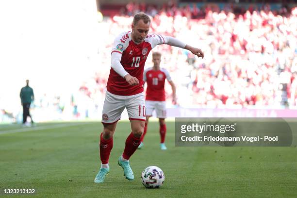 Christian Eriksen of Denmark in action during the UEFA Euro 2020 Championship Group B match between Denmark and Finland on June 12, 2021 in...