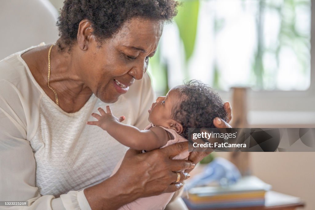 Quality time with newborn granddaughter