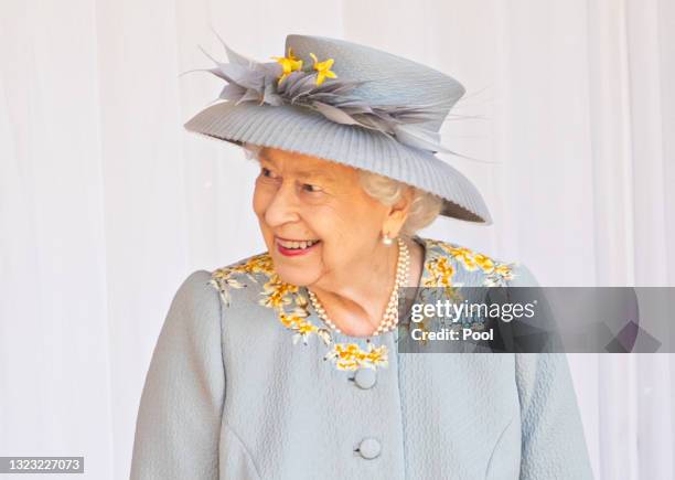 Queen Elizabeth II attends the Trooping of the Colour military ceremony in the Quadrangle of Windsor Castle to mark her Official Birthday on June 12,...