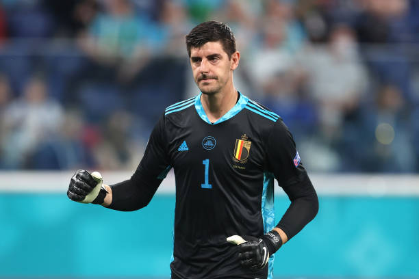 Thibaut Courtois of Belgium celebrates their side's first goal scored by team mate Romelu Lukaku during the UEFA Euro 2020 Championship Group B match...