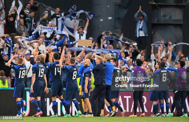 Players of Finland celebrates their side's victory after the UEFA Euro 2020 Championship Group B match between Denmark and Finland on June 12, 2021...