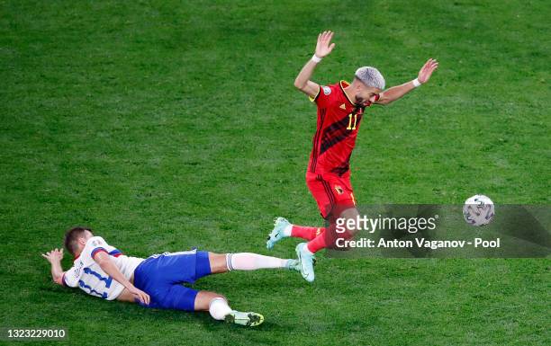 Yannick Carrasco of Belgium is challenged by Roman Zobnin of Russia during the UEFA Euro 2020 Championship Group B match between Belgium and Russia...