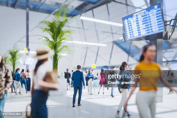 multitudes de personas caminando en el aeropuerto - concourse fotografías e imágenes de stock