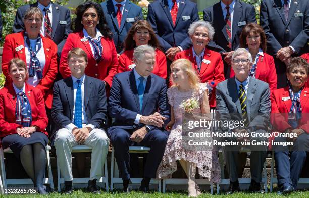 Christopher Nixon Cox front center left, sits with his parents, Edward Cox, and Patricia Nixon Cox, daughter of the 37th United States President...