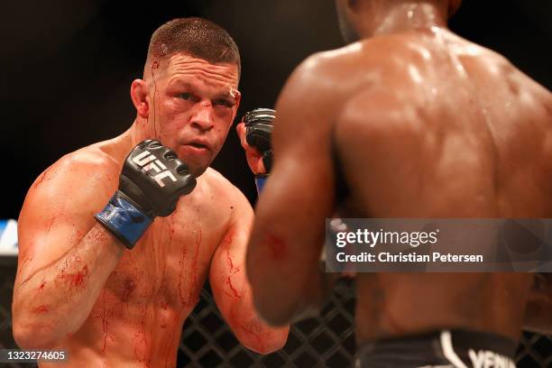 Nate Diaz fights Leon Edwards of Jamaica during their UFC 263 welterweight match at Gila River Arena on June 12, 2021 in Glendale, Arizona.