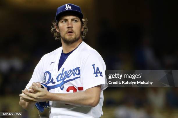 Trevor Bauer of the Los Angeles Dodgers looks on after giving up a hit to Joey Gallo of the Texas Rangers during the fifth inning at Dodger Stadium...