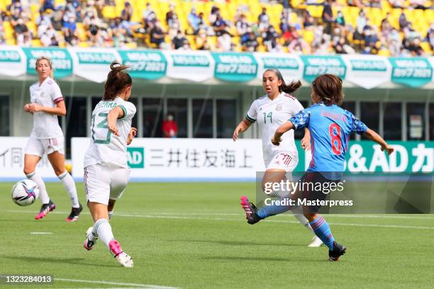 Mana Iwabuchi of Japan scores her side's first goal during the women's international friendly match between Japan and Mexico at Kanseki Stadium...