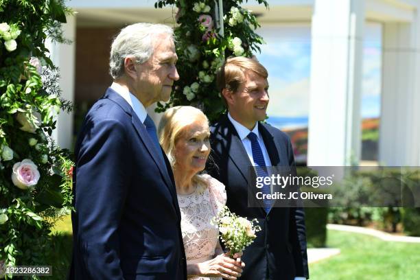 Edward F. Cox, Tricia Nixon Cox and Christopher Nixon Cox attend an outdoor rose garden party honoring Covid-19 frontline workers on their 50th...