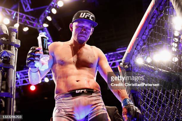 Nate Diaz exits the octagon after losing in an unanimous decision to Leon Edwards of Jamaica during their UFC 263 welterweight match at Gila River...