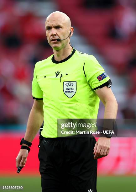 Referee Anthony Taylor look on during the UEFA Euro 2020 Championship Group B match between Denmark and Finland on June 12, 2021 in Copenhagen,...