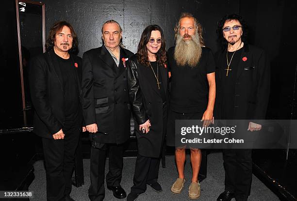 Musicians Geezer Butler, Bill Ward, Ozzy Osbourne, Rick Rubin and Tony Iommi pose backstage during Black Sabbath Reunion Press Conference at The...