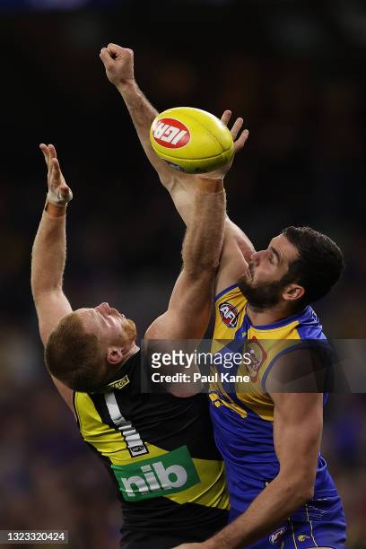 Jack Darling of the Eagles spoils the mark for Nick Vlastuin of the Tigers during the round 14 AFL match between the West Coast Eagles and the...
