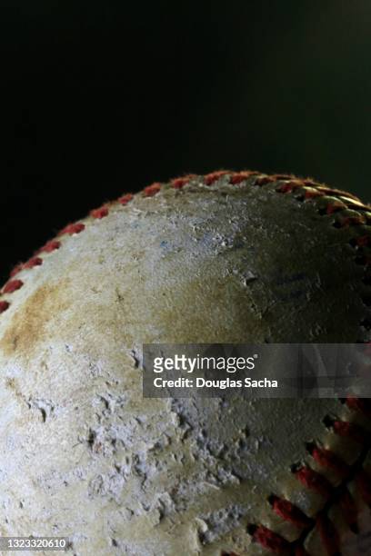 baseball mitt with hard ball - softball stockfoto's en -beelden