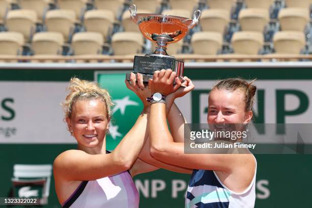 Katerina Siniakova and Barbora Krejcikova of The Czech Republic pose with the trophy after winning their Women's Doubles Final match against Bethanie...