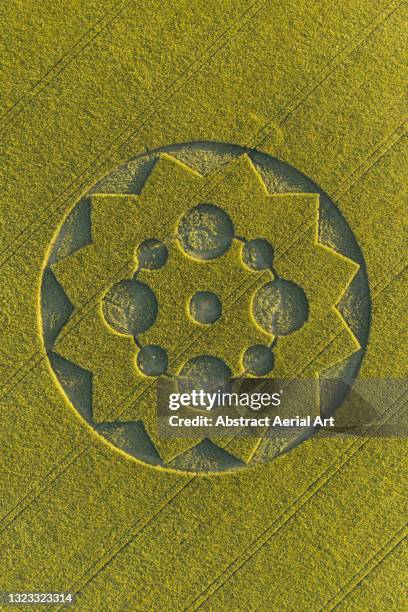 crop circle in an agricultural field seen from directly above, england, united kingdom - crop circles stock pictures, royalty-free photos & images