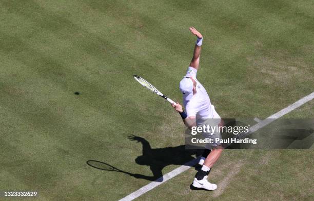 Illya Marchenko of Ukraine serves during his Men's Singles Qualifying match against James Ward of Great Britain at the cinch Championships 2021 at...