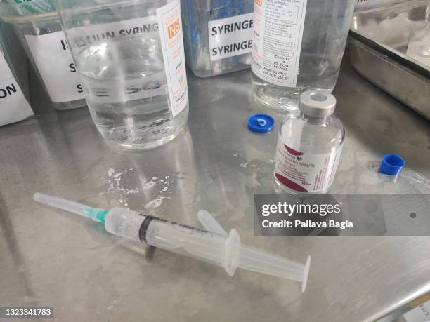 An anti covid drug Remdesivir being prepared as an injection to be given to a corona patient at the All India Institute of Medical Sciences on May...