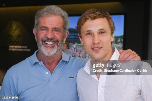 Actors Mel Gibson and William Moseley attend the French Open 2021 at Roland Garros on June 13, 2021 in Paris, France.
