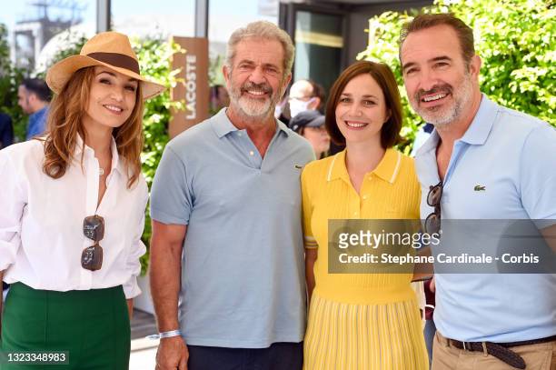 Nadia Fares, Mel Gibson, Nathalie Pechalat and Jean Dujardin attend the French Open 2021 at Roland Garros on June 13, 2021 in Paris, France.