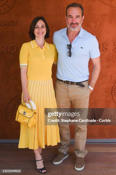 Nathalie Pechalat and Jean Dujardin attend the French Open 2021 at Roland Garros on June 13, 2021 in Paris, France.