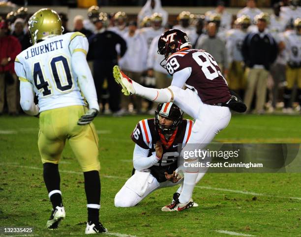 Cody Journell of the Virginia Tech Hokies kicks against the Georgia Tech Yellow Jackets at Bobby Dodd Stadium on November 10, 2011 in Atlanta,...