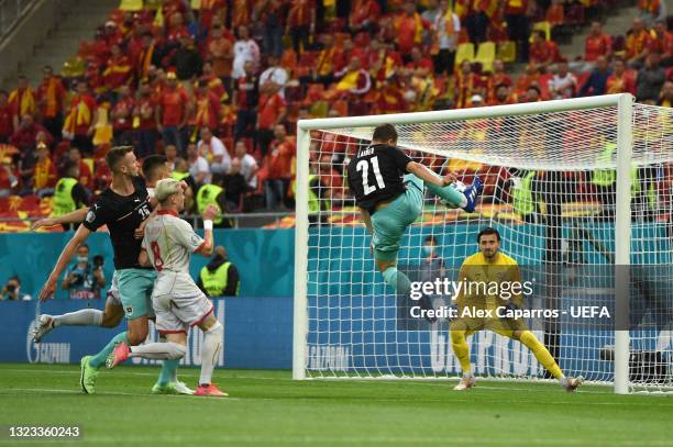 Stefan Lainer of Austria scores their side's first goal past Stole Dimitrievski of North Macedonia during the UEFA Euro 2020 Championship Group C...