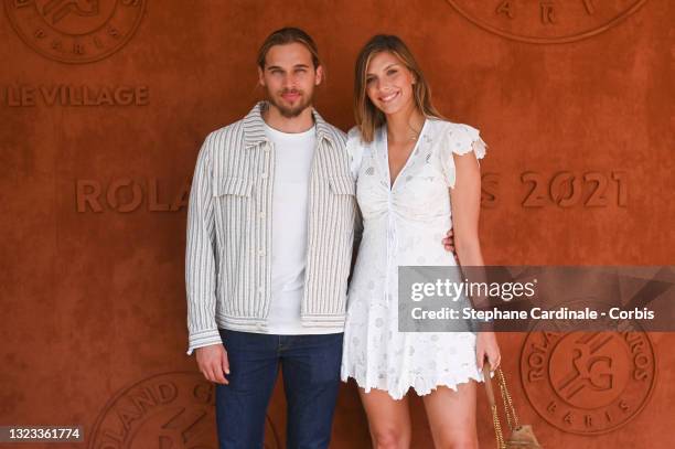 Théo Fleury and Camille Cerf attends the French Open 2021at Roland Garros on June 13, 2021 in Paris, France.