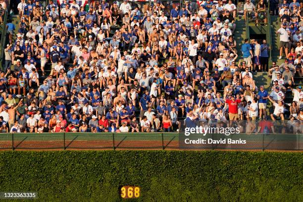 General view of fans in the bleachers during a game between the Chicago Cubs and the St. Louis Cardinals at Wrigley Field on June 12, 2021 in...