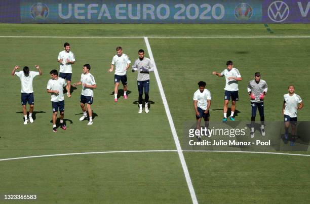 Players of Spain warm up during the Spain Training Session ahead of the Euro 2020 Group E match between Spain and Sweden at Estadio La Cartuja on...