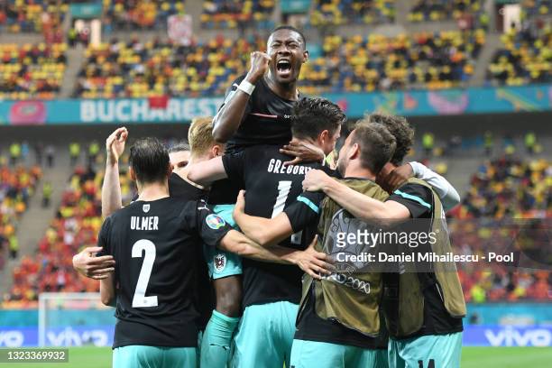 Michael Gregoritsch of Austria celebrates with David Alaba and team mates after scoring their side's second goal durng the UEFA Euro 2020...