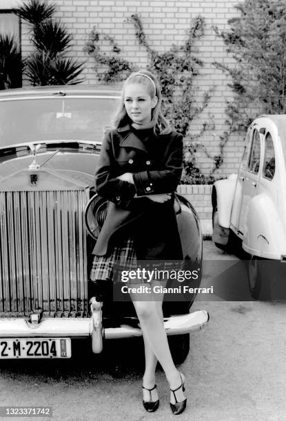 Serbian-Italian film actress Beba Loncar and American actor Georges Chakiris, before the filming of "Sharon vestida de rojo", Madrid, Spain, 1967.