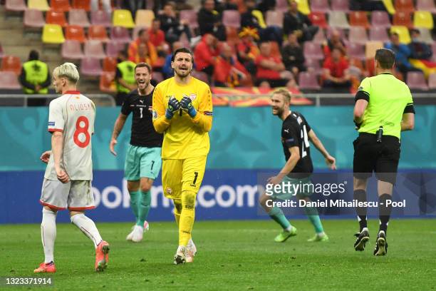 Stole Dimitrievski of North Macedonia looks dejected after conceding their side's third goal scored by Marko Arnautovic of Austria during the UEFA...