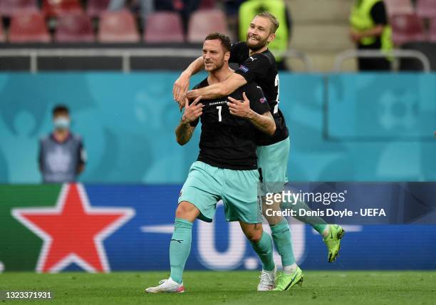 Marko Arnautovic of Austria celebrates with Konrad Laimer after scoring their side's third goal during the UEFA Euro 2020 Championship Group C match...